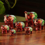 Load image into Gallery viewer, ExclusiveLane 'Seven Tuskers in Maroon' Decorative Elephant Showpieces for Home Décor (Set of 7, Fibre)|Handcrafted Showpiece for Living Room Showpiece for Gift Antique Showpieces for Bedroom Figurine